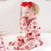 Sweet Like Candy Ruffle Zipper Footie | Pink