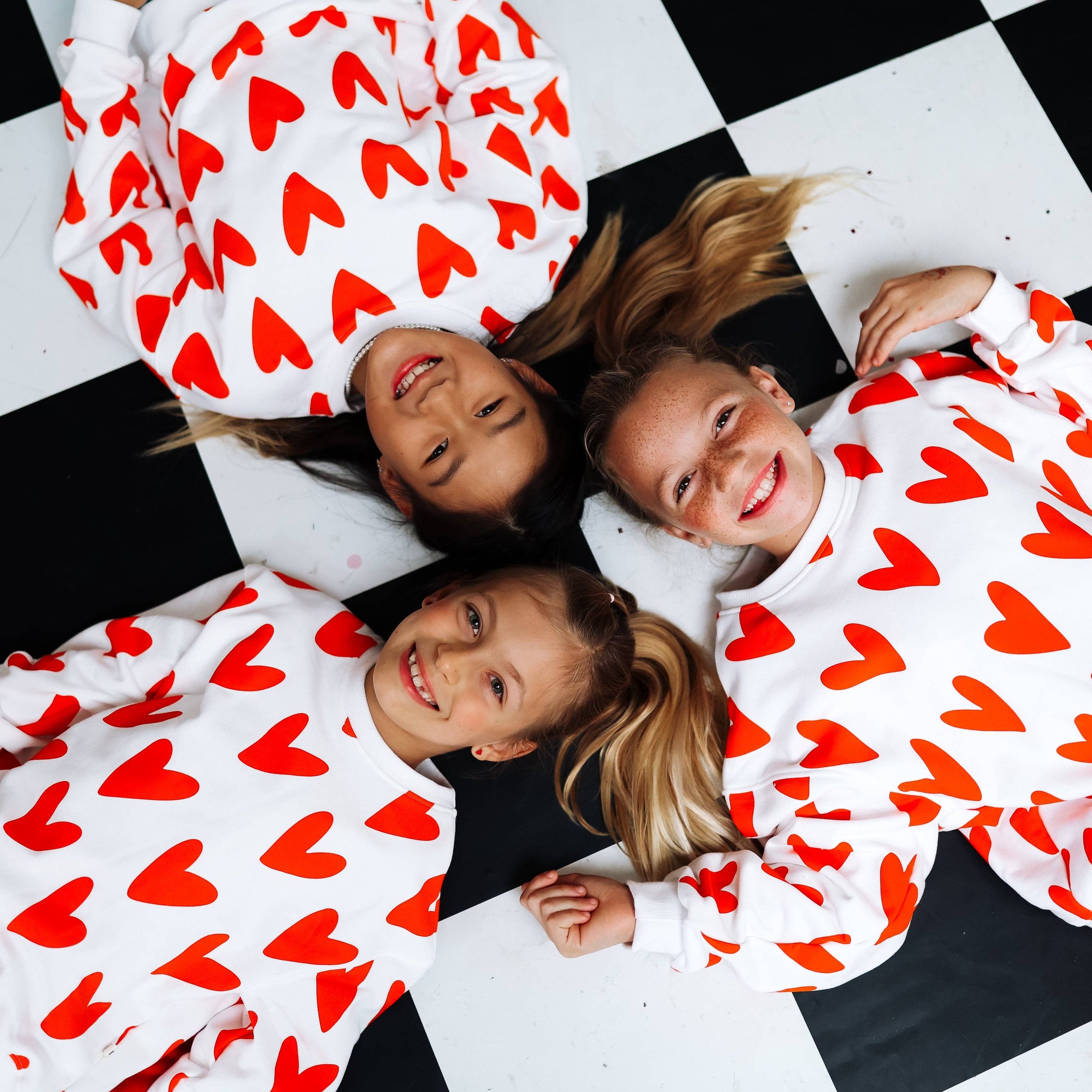 HEARTS ALL OVER | oversized drop shoulder pullover