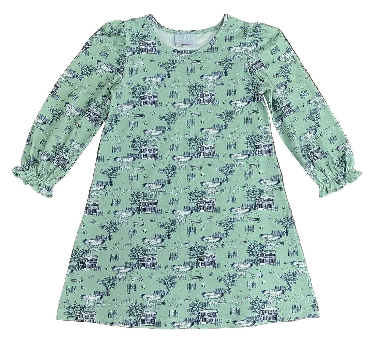 Green dress with a pattern on a wooden surface