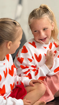 HEARTS ALL OVER | oversized drop shoulder pullover