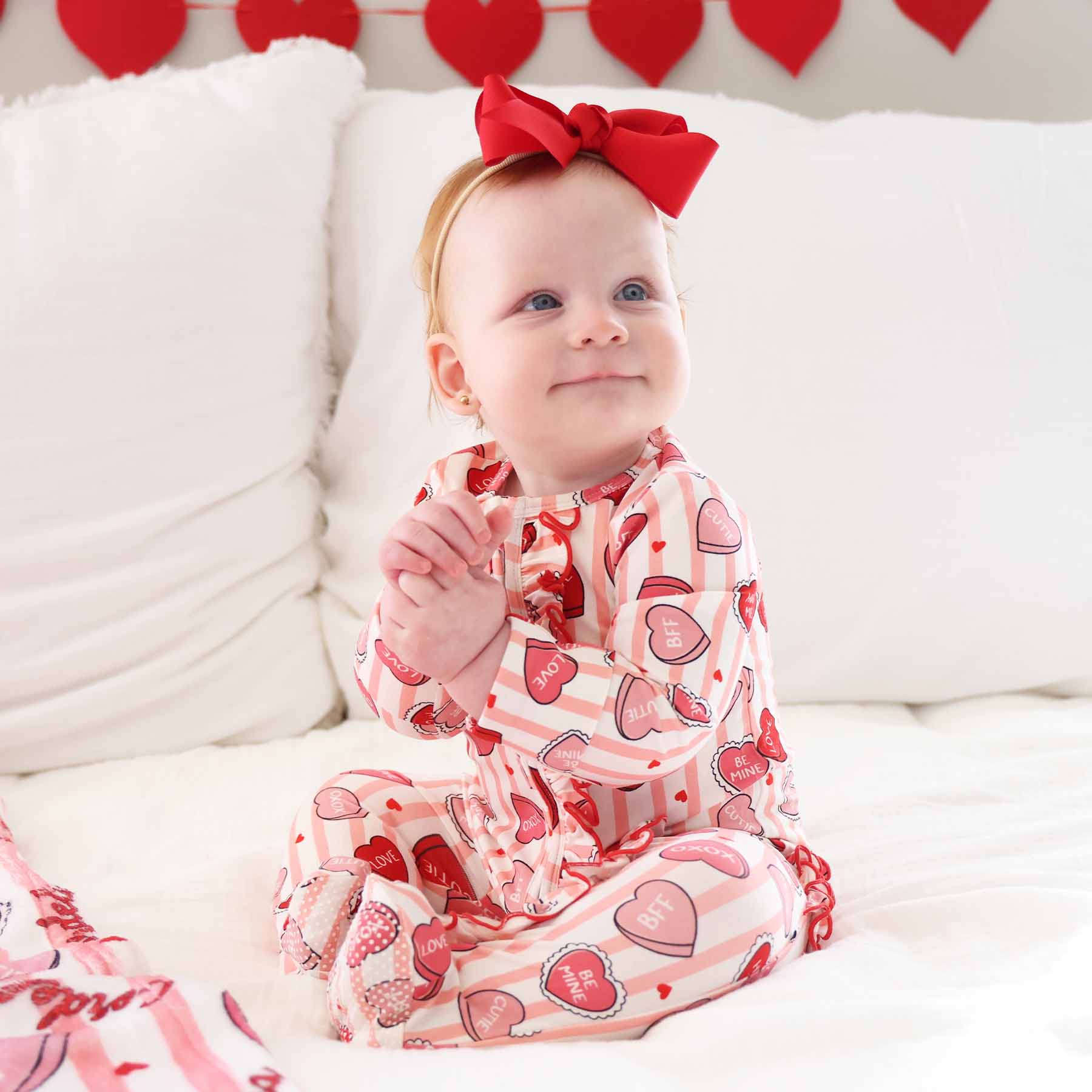 Sweet Like Candy Ruffle Zipper Footie | Pink