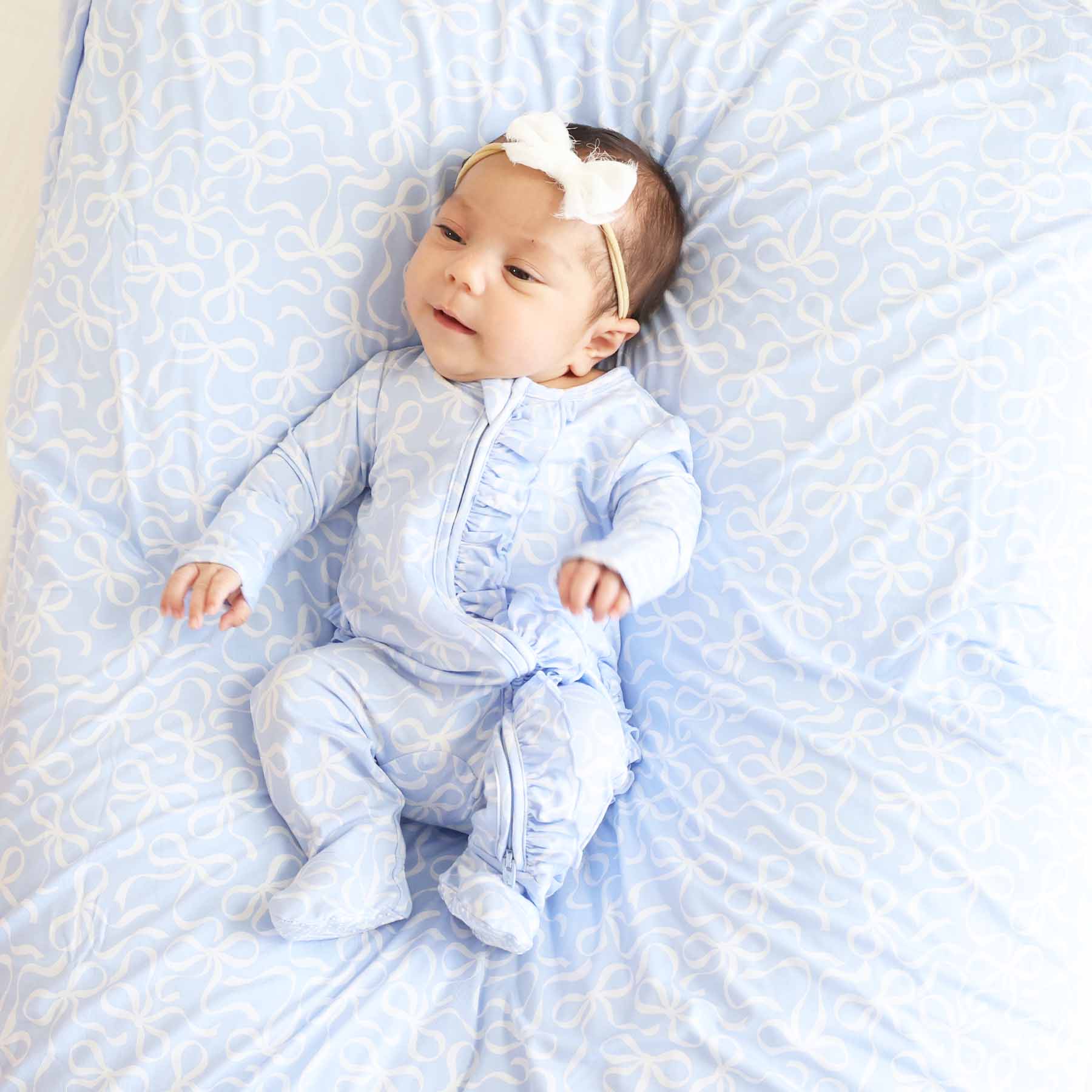 Blue-tiful Bows Ruffle Zipper Footie