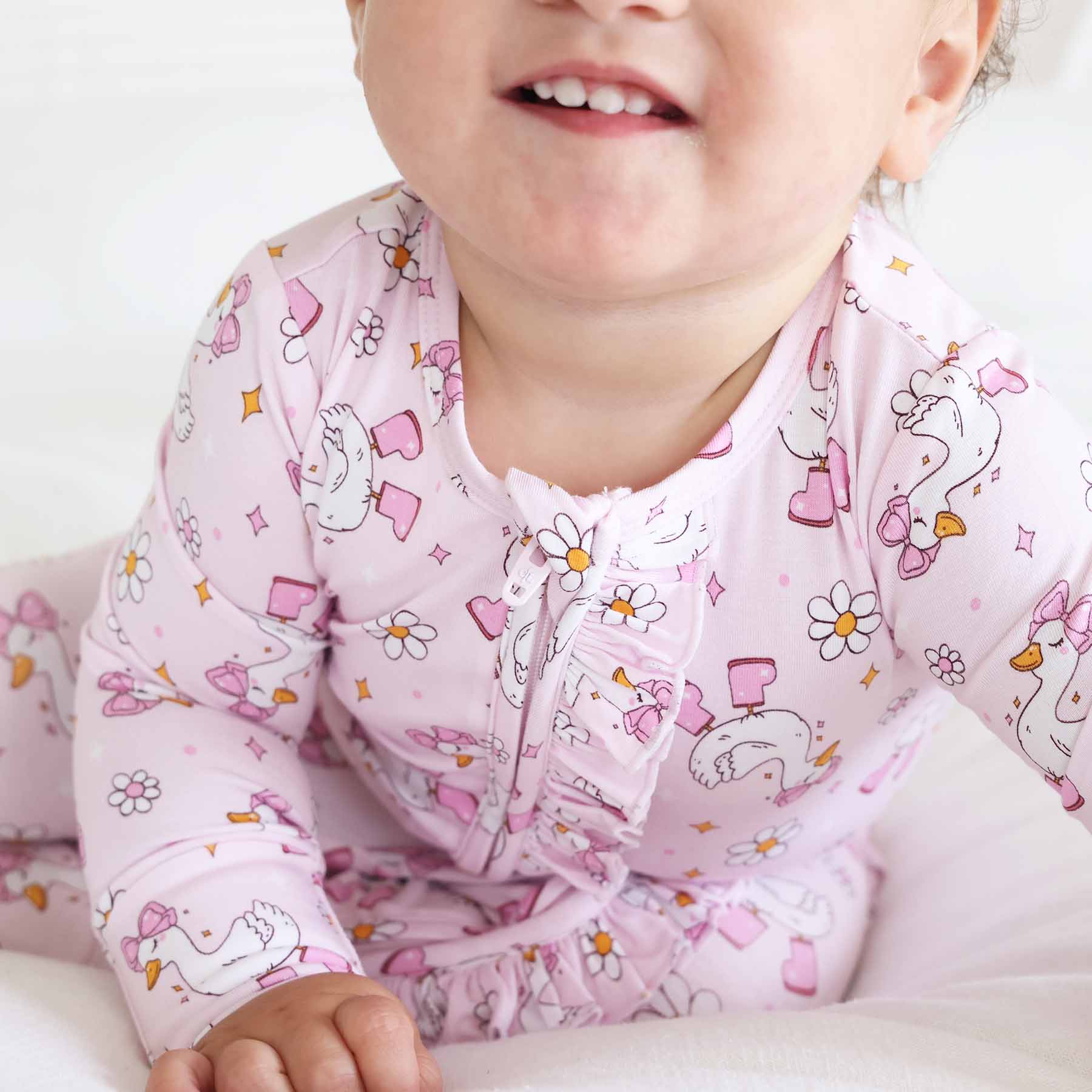 Silly Goose Ruffle Zipper Footie | Pink